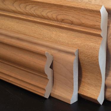 China Anti-scratch Oak Veneered Walnut Veneer Wrapped Veneer MDF Profiles Skirting Boards for sale