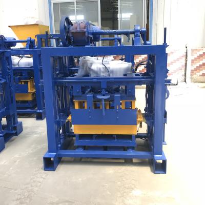 China building material shops cheap brick making machines/manual interlocking brick block making machine qtj4-40 for sale