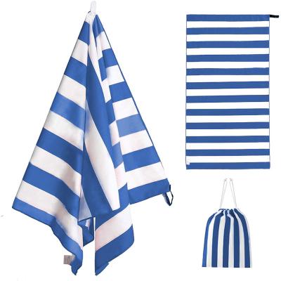 China Hot Selling Compressed Amazon Stripe Bath Towel Microfiber Pool Towel for sale