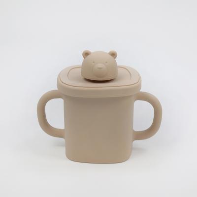 China Cute Convenient Straw Cup 2022 BPA Silicone Binaural Training Drinkware Free Cup Infant Baby Training Cup for sale