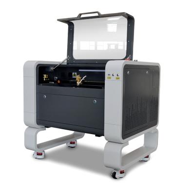 China Laser CUTTING 50W 60W 80W 100W WR6040 CO2 Laser Engraving Cutting Machine For Nonmetal for sale