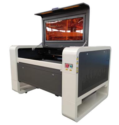 China Laser CUTTING WER 9060 80W 100W 130W 150W CO2 Laser Engraving Machine For Nonmetal for sale