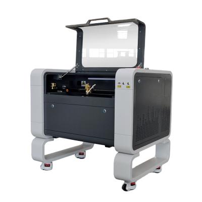 China Water Cooled Laser Wood Cutter CNC Laser Cutting Machine CO2 4060 Glass Engraving Machine in Shandong for sale