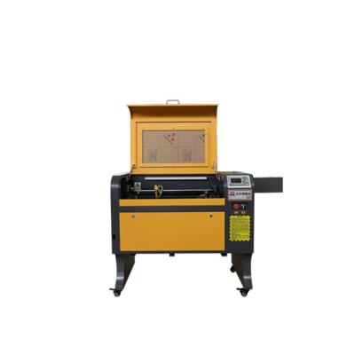 China Laser CUTTING WER6040 rubber stamp Mini Used Laser Engraver Machine for sale