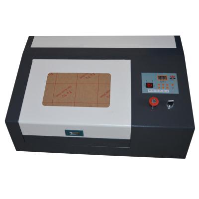 China Laser CUTTING WR3020 40W CO2 Laser Engraving Machine Cutting Machine Factory for sale