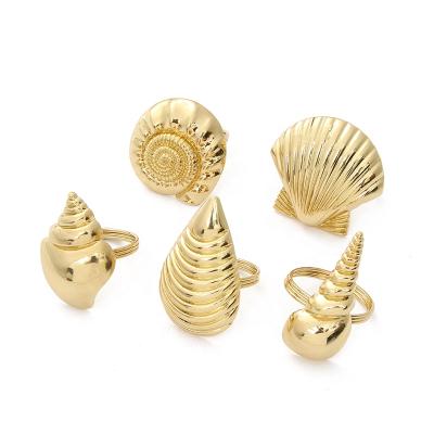 China Viable CURRENT Gold Metal Mixed Shell Shapes Ocean Marine Napkin Rings for Home Decor, Set of 5 for sale