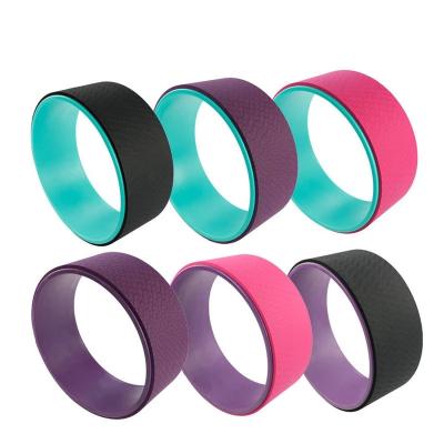 China New Eco-friendly Different Color Gymnasium Yoga Wheel Eco-friendly Products Stretching Wheel Ring for sale