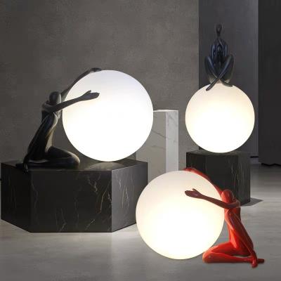 China Polyresin Cute and Lovely Nordic Abstract Human People Lamp Decoration LED Black Home Light for sale