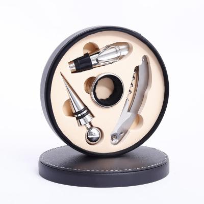 China Stocked Wine Accessories Gift 4pcs Set With A Round Leather Gift Box for sale