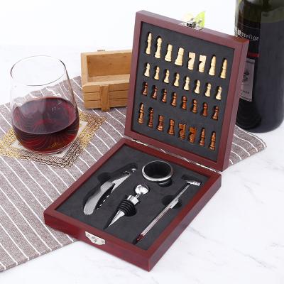 China Wooden box stocked with international chess wine tool kit for sale