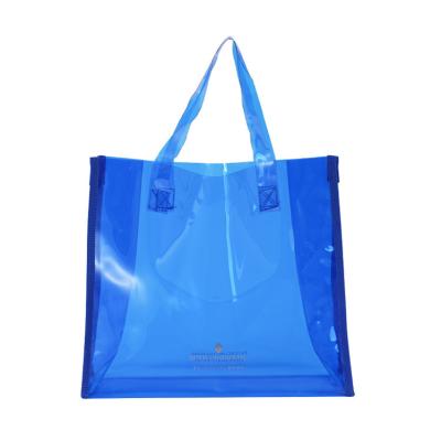 China Good Quality PVC Tote Bag Blue Plastic Tote Bag Clear PVC Beach Bag Simple And Beautiful Black Strap Bag Plastic Handbag for sale