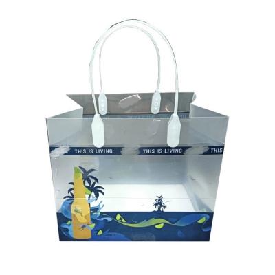 China Fashion thickened universal plastic beer handbag transparent plastic bag white handle can be customized and printed beverage packaging for sale