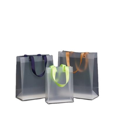 China Simple And Beautiful New Product Apparel Shopping Gift Plastic Bag Handbag Clear Frosted Plastic Bag for sale