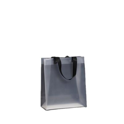 China Fashoion PP handbag transparent plastic frosted gift packaging bag knitted rope with gift bag made in China factory direct sales packaging bag for sale