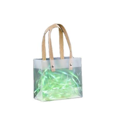 China Fashoion plastic transparent handbag gift bag pp frosted PVC gift plastic waterproof bag plastic gift bag for sale