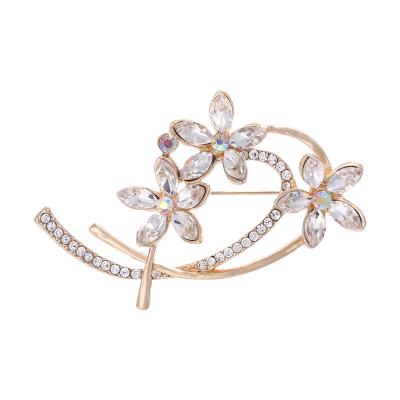 China Western diamond brooches mix design fashion jewelry style elegant clothing accessories crystal brooch for sale