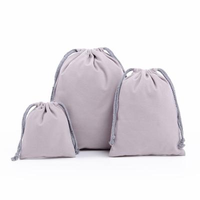 China 100% Eco-Friendly Bolsas De Lona Compras Promocional Regalo Ready Made Eco Friendly Cotton Bag Drawstring For Guests for sale