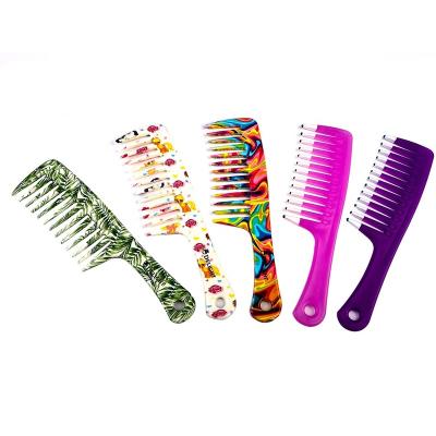 China Amazing High Quality Smooth Mini Plastic Scalp Hair Wide Tooth Combs For Women for sale