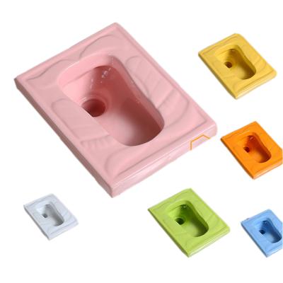 China Without Fender Child Sanitary Ware Ceramic Colorful Kids Squatting Pan For Kindergarten for sale