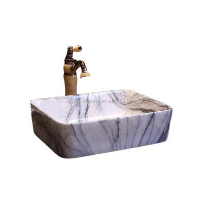 China Shampoo Sinks Luxury Ceramic Marble Art Style Bathroom Sink Hand Made Basin for sale