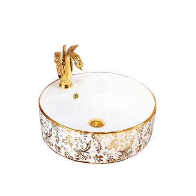 China Sustainable Above Mounted Ceramic Round Wash Sink Gold Color Basin With Faucet Hole for sale