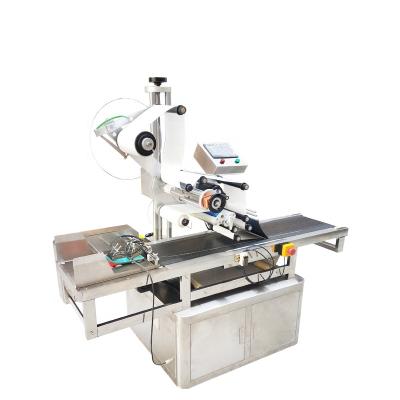 China Food labeling machine automatic pocket labeling machine for plastic bag for sale