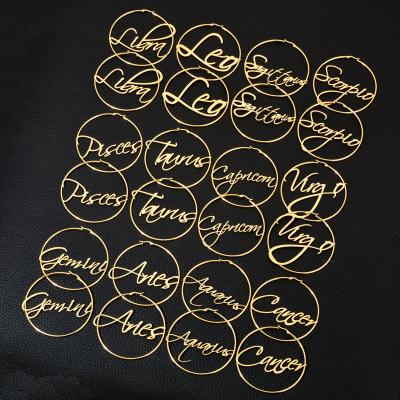 China Fashion 18k Gold Plated Stainless Steel English Letter 8cm Round Earrings Exaggerated Women Horoscope Circle Earring Zodiac Earrings for sale