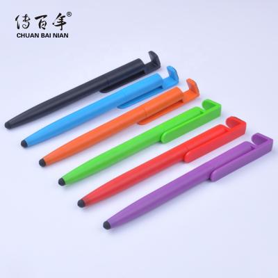 China 2021 Promotional Novelty 4 in 1 Pluma Stylus Pen Mobile Phone Holder Stand Pen with Clean Screen for sale