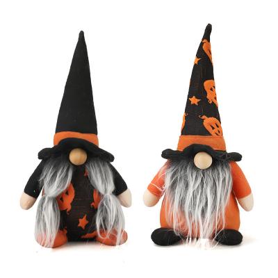 China Classic Holiday Decoration Party Halloween Plush Doll Faceless Gnome Holding Halloween Witch for sale