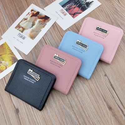 China Hot Girls PU Folding Leather Purses Custom Student Coin Purse Shorts Coin Purse Wallet With Logo for sale