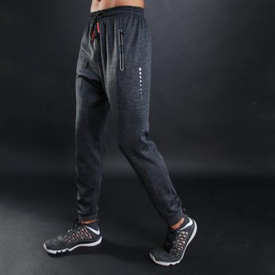 China Anti-wrinkle Men Hide Track Pant Workout Waterproof Running Pants Climbing Sweatpants for sale