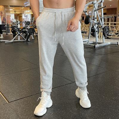 China Wholesale Cheap Gray Logo Track Pants Gym Sweatpants Breathable Men's Long Sportswear Custom Clothing Long Pants Blank Training Pants for sale