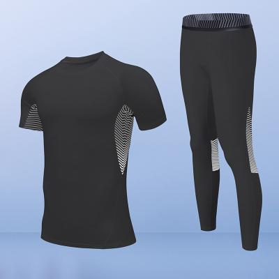 China Cheap QUICK DRY Men's Gym Clothing Sets Running 2 Piece Fitness Compression Suit Men's Bodybuilding Wear 2 Pcs Sets for sale