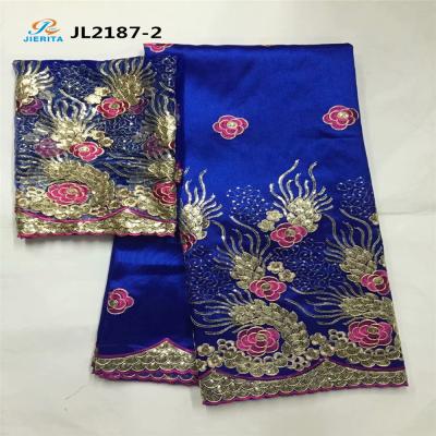 China JL2187-1 Cotton Georges Fabric Viable Hot Selling Royal Blue Embroidery With African Sequins Lace Designs Lace Up Blouse for sale