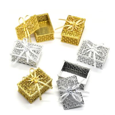 China RELIGIOUS Gold Cross Bow Box Wedding Gift Packing Box Jewelry Package Box 4.2*6*2.5cm for sale