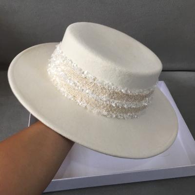 China 100% New Styles OEM Styles Wool Felt Hats Solid White Mountaineer Fedora Hats Wide Brim Women for sale