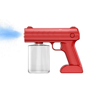 China Portable Hot Nano Atomizer Handheld Hot Atomizer Disinfection Spray Gun 2M Spray Distance Wireless Blue Light Disinfection Sprayer for sale