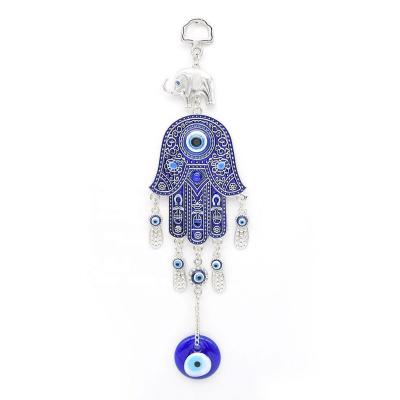 China Wholesale Luxury Turkish Blue Eyed Home Decoration Elephant Palm Hamsa Eye Glass Opens Wall Pendant Business Gifts for sale