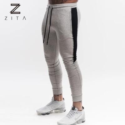 China Breathable Warm Custom Design Active Mens Sports Wear Fitness Jogger Pants With Zipper Pocket for sale