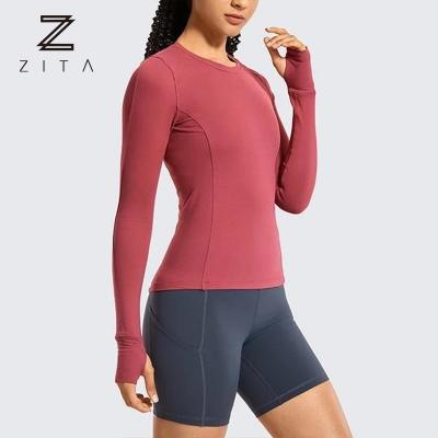 China New Design Women's Compression Workout Breathable Fitness Top Rider Long Sleeve T-Shirt With Phone Pocket for sale