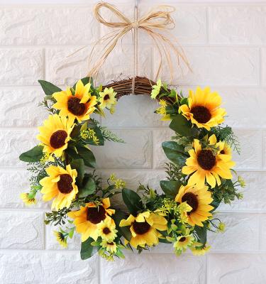 China Sale Silk Hot Spring Flower Plant Sunflower Garland Artificial Vine Wreath For Outer Door Decoration for sale