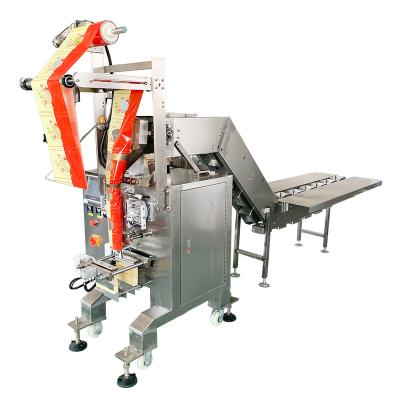 China Semi automatic hydraulic food rosary sachet packaging machine, measuring cup and semi automatic hydraulic rosary packing machine for sale