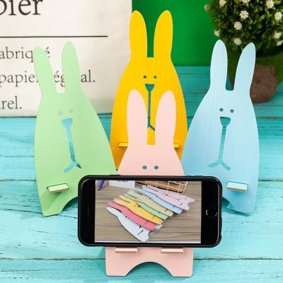 China Lovely Rabbit Design Cute Durable Wood Phone Holder Universal Stand Mount Desk Holder for Smartphones for sale