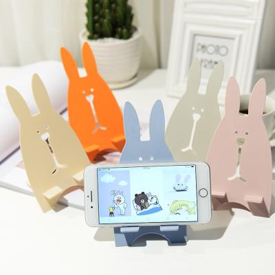 China Stand Mount Wood Desk Stand For Smartphones Creative Lovely Rabbit Design Promotional Gifts Cute Durable Wooden Phone Stand for sale