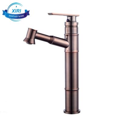 China Traditional Classic Oil Rubbed Bronze Pull Out Brass Single Tap Mixer Deck Mount Hole Basin Water Tap Hot And Cold Water Brass for sale