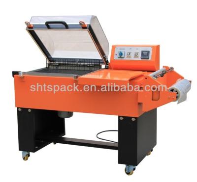 China Manual CLOTHING Candy Box Shrink Wrapping Machine Shanghai for sale