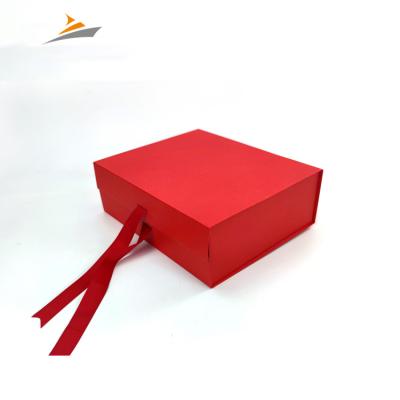 China Recyclable Customized Red Logo Environment-Friendly Paper Package Clothing Packaging Gift Box With Ribbon Closing Handle for sale