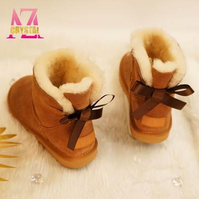 China Fashion Trend USA Glitter Wholesale Winter Kids Women Outdoor Boots Customized Sheepskin Sparkle Rhinestone Rhinestone Shiny Snow Boots for sale