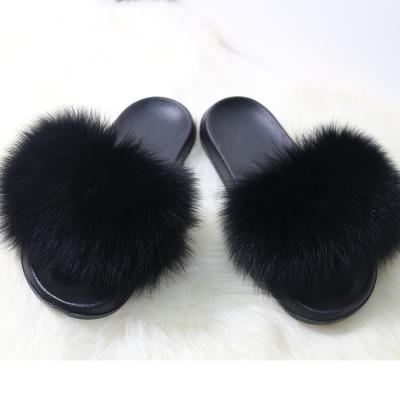 China Fashion trend design lovely fur slides for women and kids black and pink fur slides huge fur slippers for sale