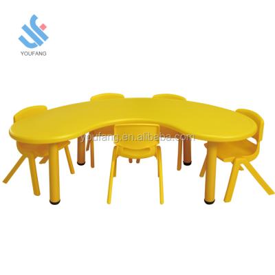 China Hot Sale YF-01002 Plastic Moon Shaped Children Desk Table School Good Price Kids Furniture Plastic Children Study Desk for sale